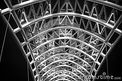 Architectural element of bridge dark night sky background. Steel glass construction illuminated many lights Editorial Stock Photo