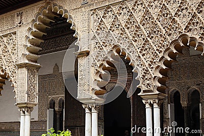 Architectural fragment of the Maiden's Court of the Moorish Palace in Alcazar, Seville, Spain Editorial Stock Photo