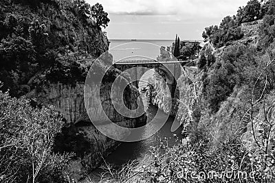 Architectural landmark, stone bridge. A view of the Fiordo of Furore in Amalfi coast, Travel and vacation concept. Summer day. Stock Photo