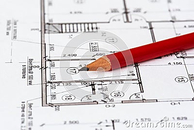 The architectural plan of the house is printed on a white sheet of paper. A red pencil on it. Editorial Stock Photo