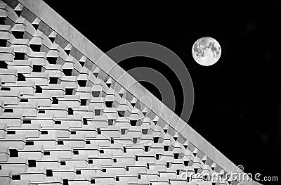 Architecture abstract photo with full moon in dark background.Fragment photo of Valletta New Parliament, Malta. Modern architectur Stock Photo