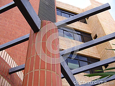 Architecture and building construction with structural steel and red bricks. Stock Photo