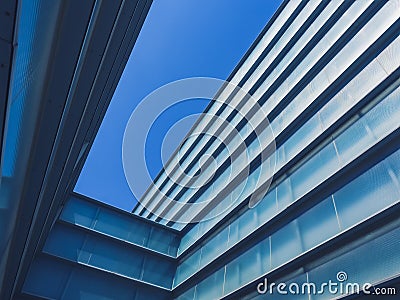 Architecture details Modern building Exterior Glass facade Blue sky Stock Photo
