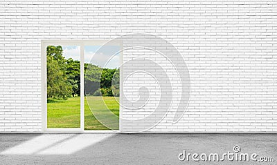 Empty space white room of white brick wall and door with green natural view in background. Stock Photo