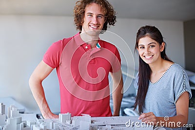 Architecture model, professional portrait and happy people planning development, project or buildings design. Partner Stock Photo