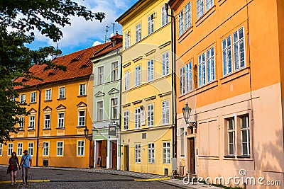 The architecture of the strago city of Prague. Multi-colored low buildings and stone paving stones. Streets of old Europe Editorial Stock Photo