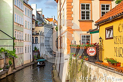 The architecture of the strago city of Prague. River channel in the city. Streets of old Europe, cityscape Editorial Stock Photo
