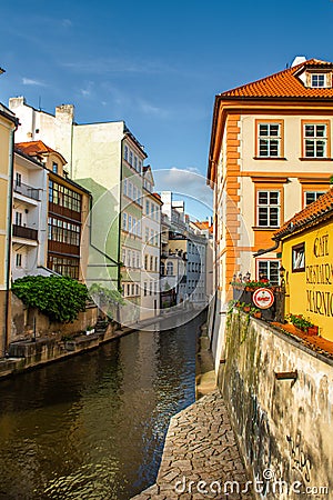 The architecture of the strago city of Prague. River channel in the city. Streets of old Europe, cityscape Editorial Stock Photo