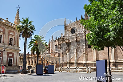 Archive Of The Indies Archivo General de Indias and Seville cathedral on Triumph square, Spain Stock Photo