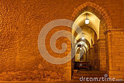 Archway in Tallinn Town Hall at Night Stock Photo