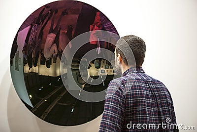 ARCO, opens in Madrid. Visitors observing the plays Editorial Stock Photo