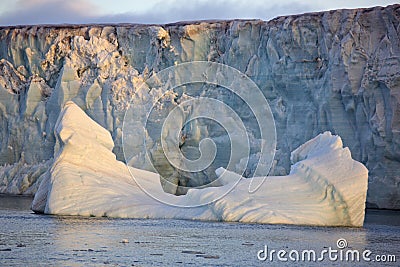 Arctic glacier and floating iceberg Stock Photo