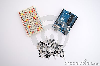 Arduino, transistors, protoboard with LED lined up Stock Photo