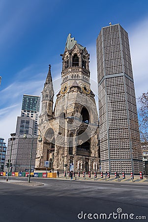 Area around `Breitscheidplatz` and `Ku`damm` with Kaiser Wilhelm memorial church and new build hotel in the center of Berlin Editorial Stock Photo