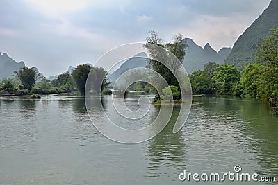 Li river runs through the fairy karst landscape of Yangshuo in Guangxi Zhuang Autonomous Region in China. Stock Photo