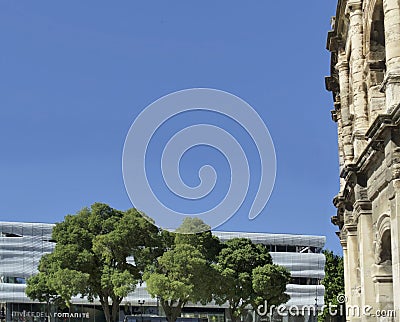 Arena and Musee Romanite in Nimes, France Stock Photo