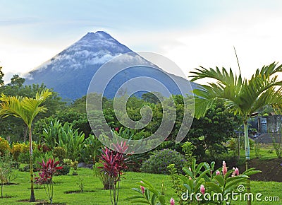 Arenal Volcano in wispy clouds Stock Photo