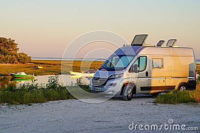 Fiat Ducato Campereve in sunset holidays motorhome and campervan parked by the sea side Editorial Stock Photo