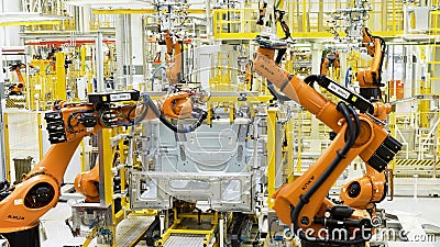 Argentina - Buenos Aires,12.11.2021: automatic robotic arm at work. Scene. Presentation of new technological robot in Editorial Stock Photo