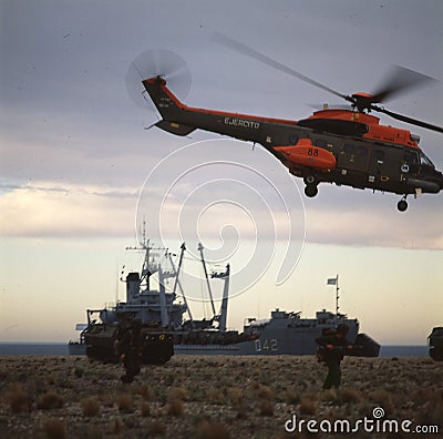 Argentine marine infantry disembarking on the coast with sea and amphibious vehicles and soldiers, historic battle of the Malvinas Editorial Stock Photo