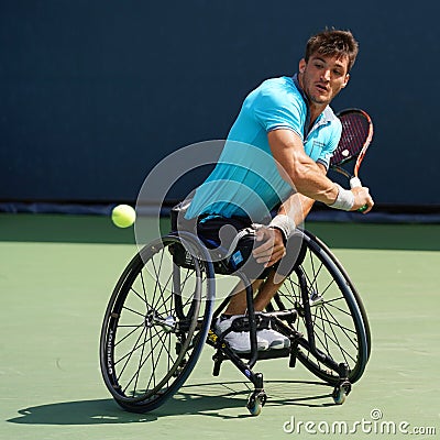 Argentinian wheelchair tennis player Gustavo Fernandez in action during US Open 2017 Wheelchair Men`s Singles semifinal Editorial Stock Photo
