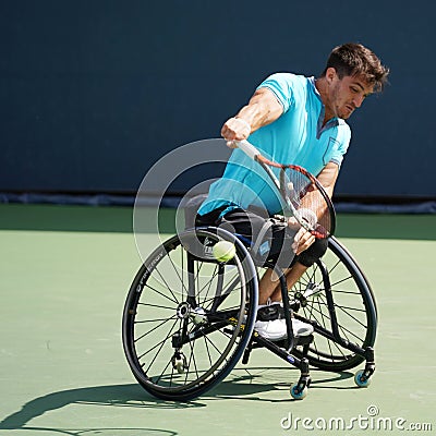 Argentinian wheelchair tennis player Gustavo Fernandez in action during US Open 2017 Wheelchair Men`s Singles semifinal Editorial Stock Photo