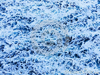 Arial view of splashing oceanic waves with bubbles and foam Stock Photo