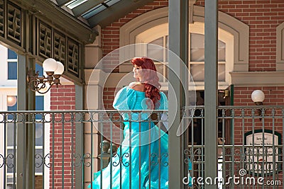 Ariel waving from the balcony at Walt Disney World Railroad at Magic Kingdom 1 Editorial Stock Photo