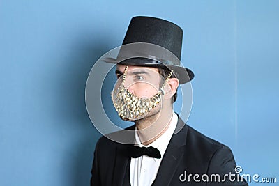 Aristocrat wearing luxurious protective face mask Stock Photo