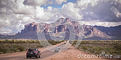 Arizona desert road leading to Superstition Mountain near Phoenix,Az,USA Stock Photo