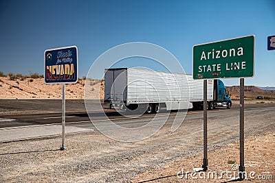 ARIZONA, USA - JUNE 19, 2018: Arizona and Nevada border along a major road Stock Photo