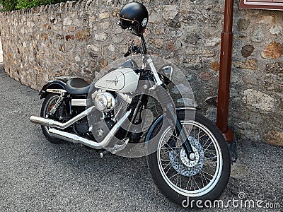 ARKUA PETRARKA, ITALY - AUGUST 13, 2019: motorcycle on the pavement of the old city Editorial Stock Photo