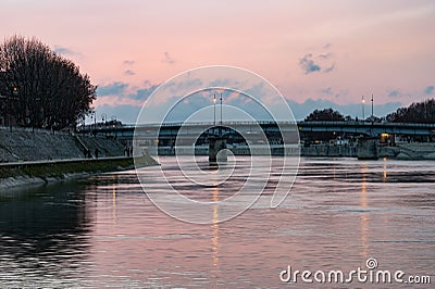 Arles, Provence, France, Promenade at the banks of the River Rhone during a colorful sunset Editorial Stock Photo