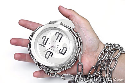 Arm chained with a clock Stock Photo