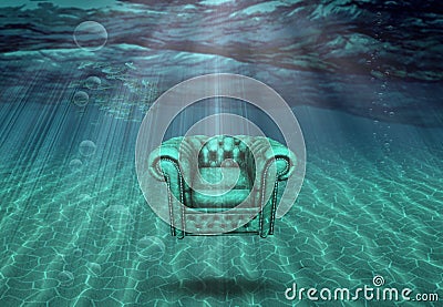 Arm chair floats in sea bottom Stock Photo