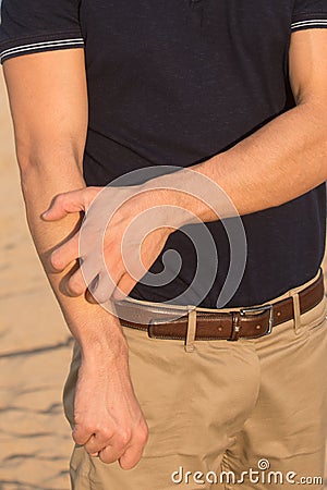 Arm itching Stock Photo