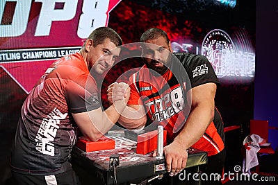 Arm Wrestlers Levan Saginashvili and Dmytro Ionov at TOP 8 Tournament in PAL Editorial Stock Photo