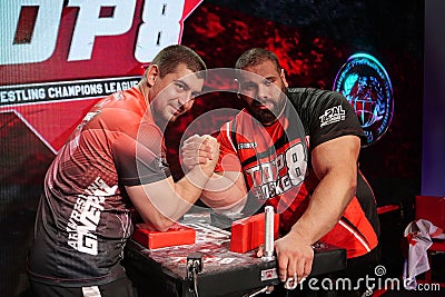 Arm Wrestlers Levan Saginashvili and Dmytro Ionov at TOP 8 Tournament in PAL Editorial Stock Photo