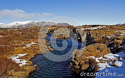 Armannsfell and the Clear Blue Water in the North Atlantic Rift, Pingvellir, Iceland Stock Photo