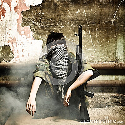 The armed Arabian woman terrorist Stock Photo