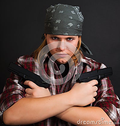 Armed bandit girl Stock Photo