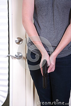 Armed woman with semi-automatic Stock Photo