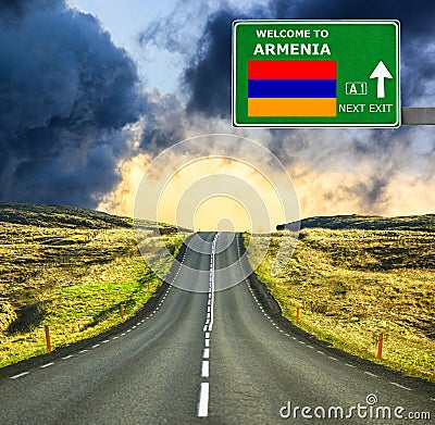 Armenia road sign against clear blue sky Stock Photo