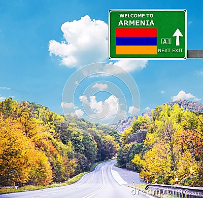 Armenia road sign against clear blue sky Stock Photo