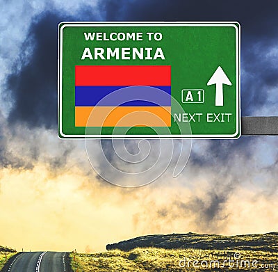 Armenia road sign against clear blue sky Stock Photo