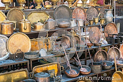 Armenia, Yerevan, September 2021. A counter with vintage copper kitchen utensils in the souvenir market. Editorial Stock Photo