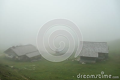 Armentarola - A small village located on the slopes of Italian Dolomites. The village is shrouded with thick fog.low visibility Stock Photo