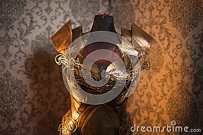 Armor of woman Strong metal breastplate handmade in gold with go Stock Photo