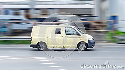 Armored encashment truck Volkswagen Transporter is driving in the city street Editorial Stock Photo