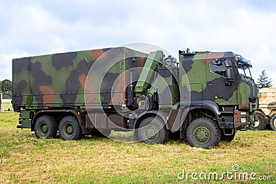 Armored truck from german army stands on a field Stock Photo